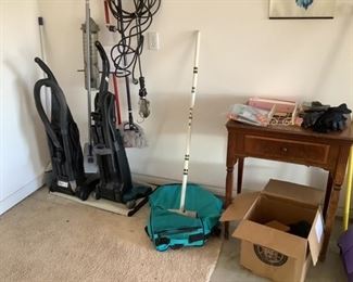 Vacuum cleaners, antique sewing machine, curling stick