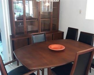 MCM Dillingham dining table with two leaves and 8 chairs AND a matching china cabinet. Homer Laughlin Fiestaware