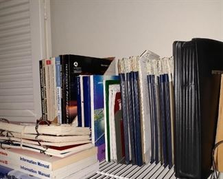Aircraft and instrument flying manuals. Airport flight maps.