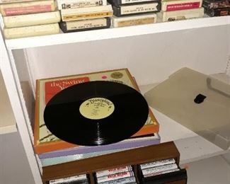 Vintage LP's, 8 track tapes, and cassette tapes.