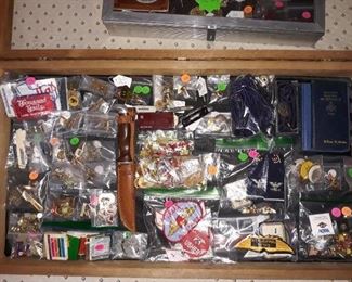 Vintage cufflinks, Shriner and Masonic pins, knives, and more.