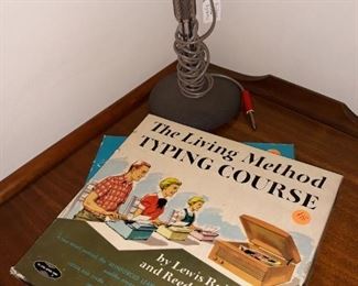 Vintage courses on LP for Spanish and typing plus a vintage Archer tabletop microphone.