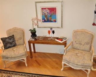 Wonderful Sitting Area includes a Pair of Armed Chairs, a lovely Sofa Table and Great Decor