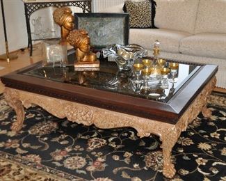 View of the Large, Ornate Carved Wood Coffee Table with Beveled Glass Insert by Marge Carson, 58"W x 19"H x 44"D