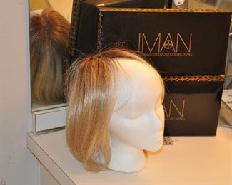 One of 2 New in Box Wigs by Iman Gorgeous Locks Collection, Including Wig, Mesh Cap Liner and Brush.  This Style is Layered Bob Wig, Classic Light Blonde.  The Other Style Available is Hollywood Curls Wig, Classic Light Blonde