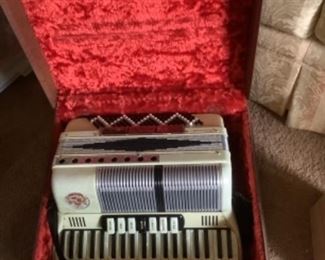 Futuramic accordion in a case.