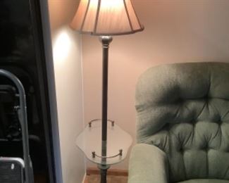 Vintage iron base lamp with glass shelf .