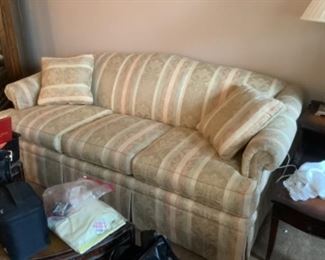 Soft green and peach and off white sofa.  Presale $95