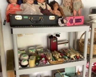 Vintage dolls and lots of candles
