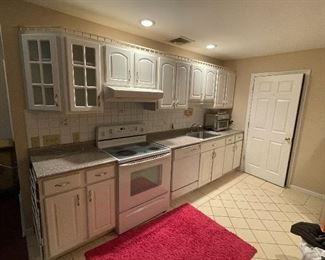 Calling all contractors! This whole kitchen set, cabinets, counter top and appliances go. 