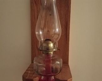 Oil lamp with wooden holder