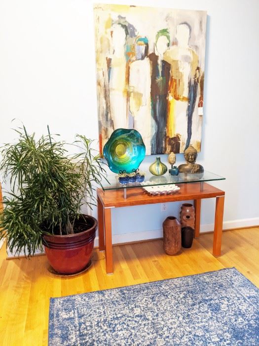 Large contemporary artwork, sofa/entryway table glass and rosewood, Large plant and decor