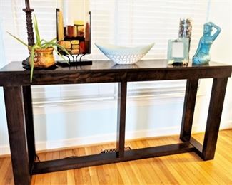 Nice hardwood sofa/entryway table with decorative pieces