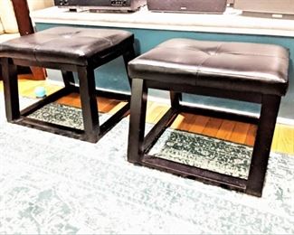 pair of black leather stools