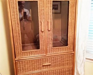 Matching wicker armoire with glass doors and three drawers