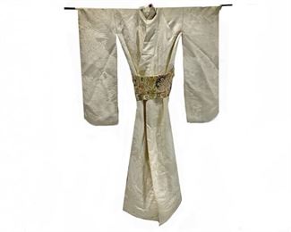 An Elegant Japanese Wedding Kimono With Sash And Display Rod
Lot #: 12