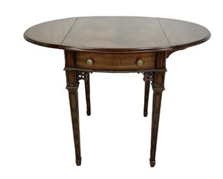A Georgian Style Mahogany Pembroke Table, Maitland Smith
Lot #: 35