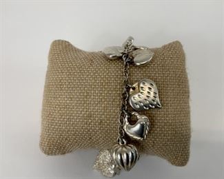 Sterling Silver Heart Charm Bracelet
Lot #: 43