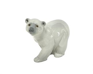 A Lladro Attentive Polar Bear Figurine
Lot #: 75