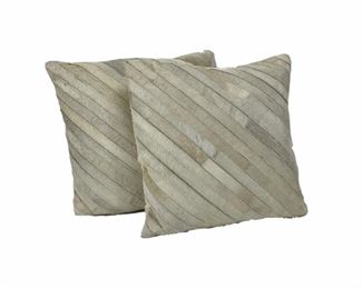 A Pair Of Safavieh Cowhide Pillows
Lot #: 124