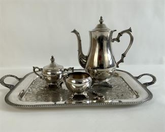 A Large Silverplate Tray, Coffee Pot, Creamer And Sugar (4 Pc.)
Lot #: 158