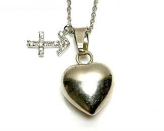 Sterling Silver Heart Pendant On Chain With Sterling Silver Crystal Arrow Charm (10.4 Grams)
Lot #: 183