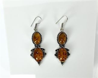 Pair Of Sterling Silver Amber Color Drop Earrings
Lot #: 198