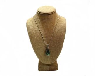 Sterling Silver Natural Abalone Necklace Together With Sterling Silver Chain (12.9 Grams)
Lot #: 200