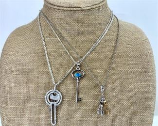 Three Sterling Silver Key Pendants Together With Sterling Silver Chains
Lot #: 206