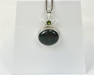 Sterling Silver Rope Chain With Agate Stone And Peridot Crystal Pendant
Lot #: 216