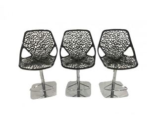 A Set Of Three Modern Black Painted Plastic And Metal Stools
Lot #: 233