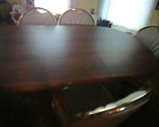 8. DINING ROOM TABLE WITH ONE LEAF HAS 6 CHAIRS WITH IT VERY GOOD CONDITION $150 FOR ALL