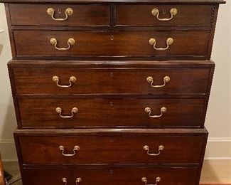 A Georgian style stacking three tier chest by Baker furniture from their Historic Charleston Reproductions  