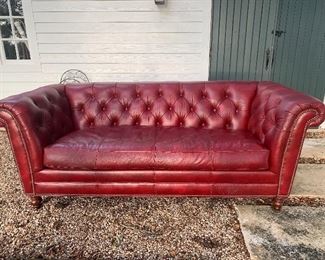 Genuine leather red couch. We have 2