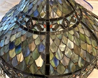 One of three Tiffany-style ceiling light fixtures