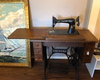 Antique singer sewing machine & cabinet