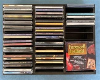 Wood Cd holder with approximately 54 CDs