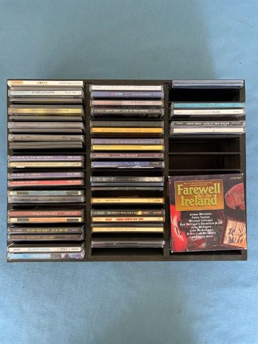 Wood Cd holder with approximately 54 CDs