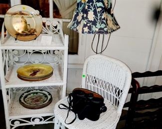 Wicker shelving, wicker chair, Royal Doulton Plates,  binoculars 