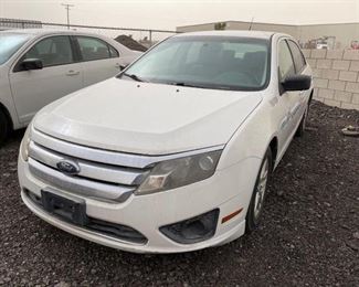 Lot 94: Year: 2010
Make: Ford
Model: Fusion
Vehicle Type: Passenger Car
Mileage: 81741
Plate:
Body Type: 4 Door Sedan
Trim Level: S
Drive Line: FWD
Engine Type: L4, 2.5L
Fuel Type: Gasoline
Horsepower:
Transmission:
VIN #: 3FAHP0GAXAR176509

Features and Notes:
