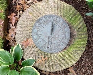 Come grow old with me, the best is yet to be. Sundial on ancient millstone