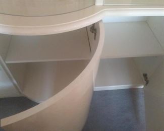 Six spacious cabinets below the glass china.