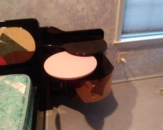 Closer look at the night stand.  It has 3 shelves. The middle one swivels back and forth for more convenient service.  In addition there are 2 drawers.