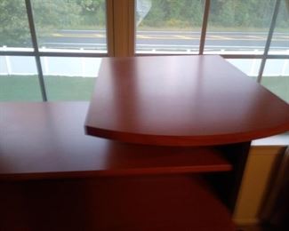 Closer look at the top level of the office desk.