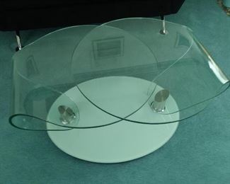 Unique and elegant glass coffee table.  
