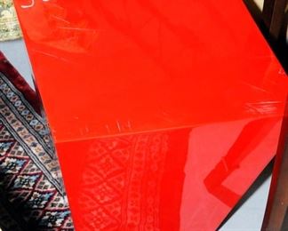 Red acrylic side table