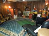 Man Cave filled with beer signs, vintage ashtrays and a kegerator