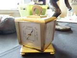 Guardier Four-Caster 8-day Brass Swivel Clock.
Name engraved on top is "George Romney"
4 sides include:
Clock
Thermometer
Barometer
Hygro