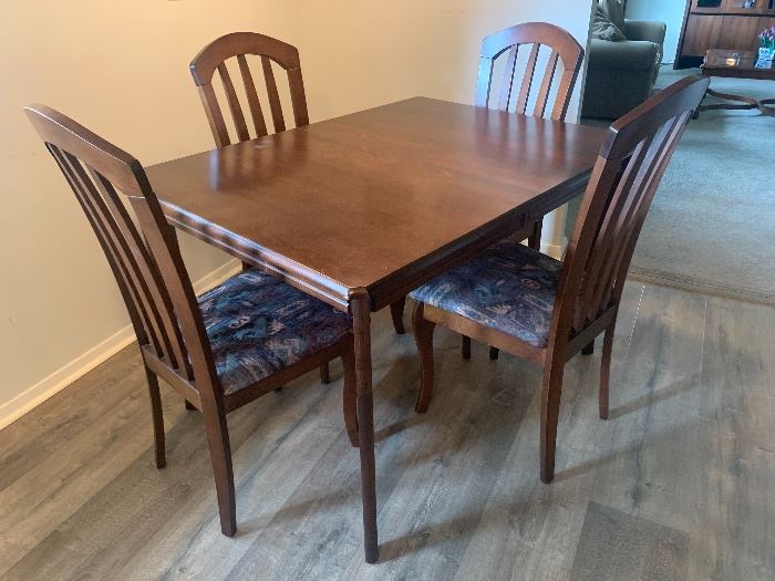 Kitchen Table w/four chairs  48"L x 34"W additional leaf to expand table.