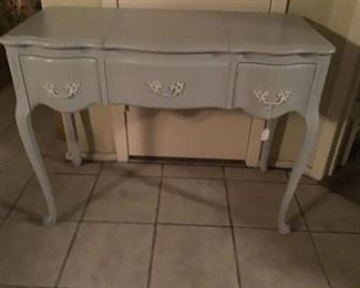 French Provincial Chalk Painted Vanity.  It has two drawers and a lift up mirror.